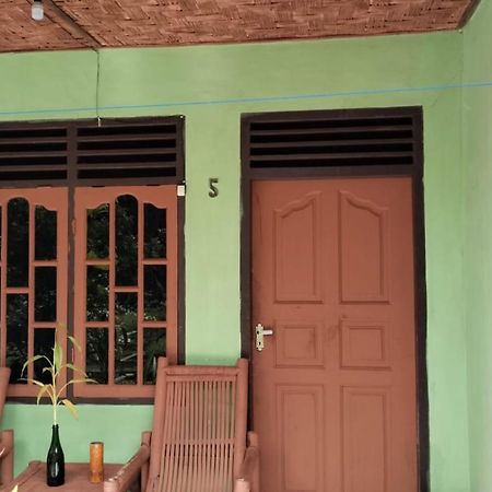 Wisma Batu Mandi Bukit Lawang Esterno foto