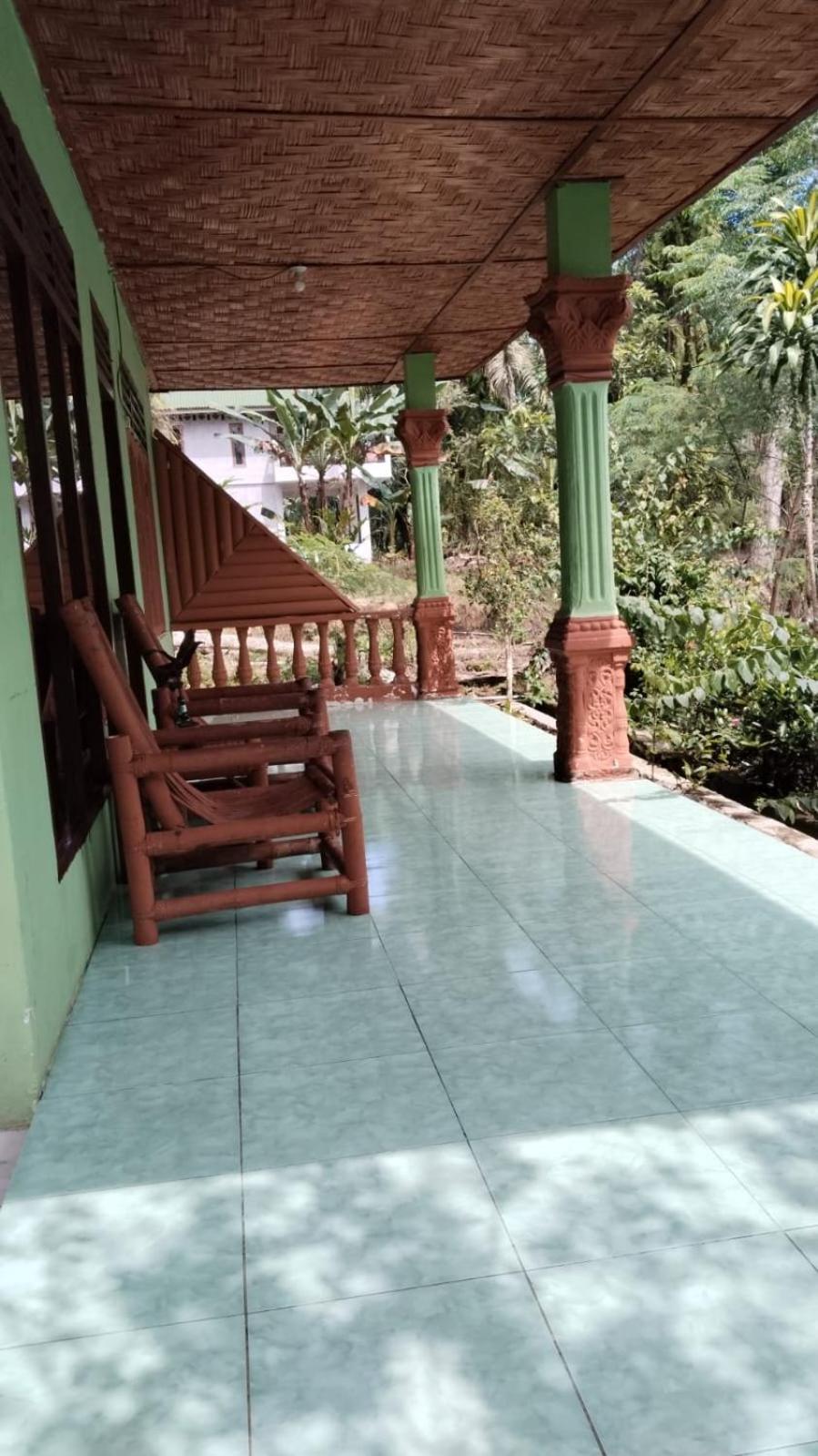 Wisma Batu Mandi Bukit Lawang Esterno foto